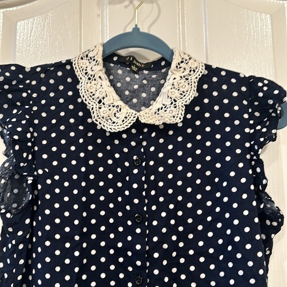 Polka dot Button Down Blouse with Lace Collar and Ruffled Sleeves - Picture 3 of 7